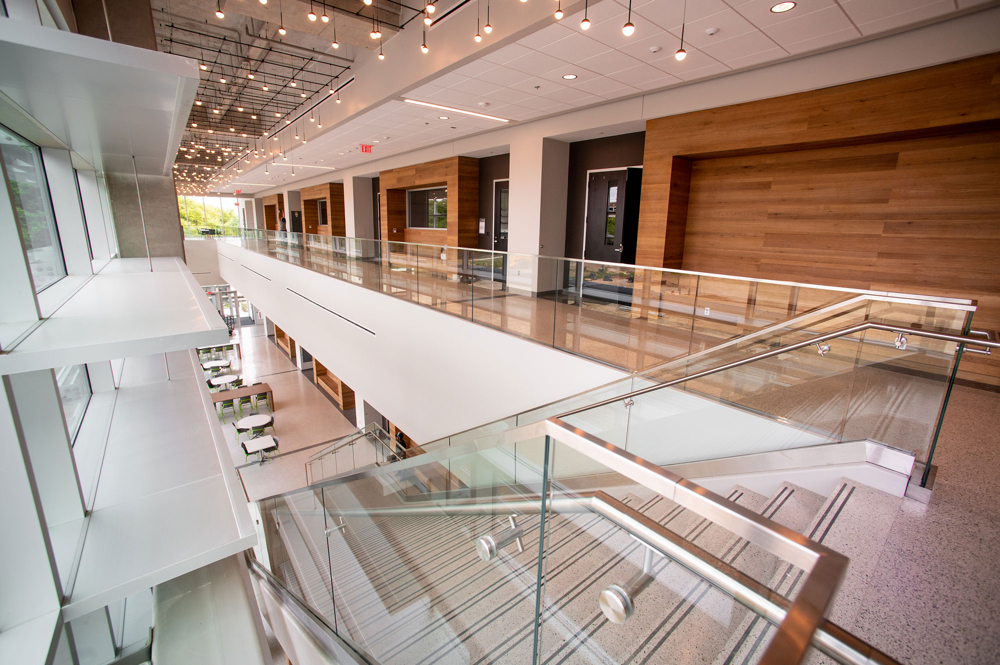 Interior of Science Hall, Science and Engineering Complex showing a stairway leading downstairs.