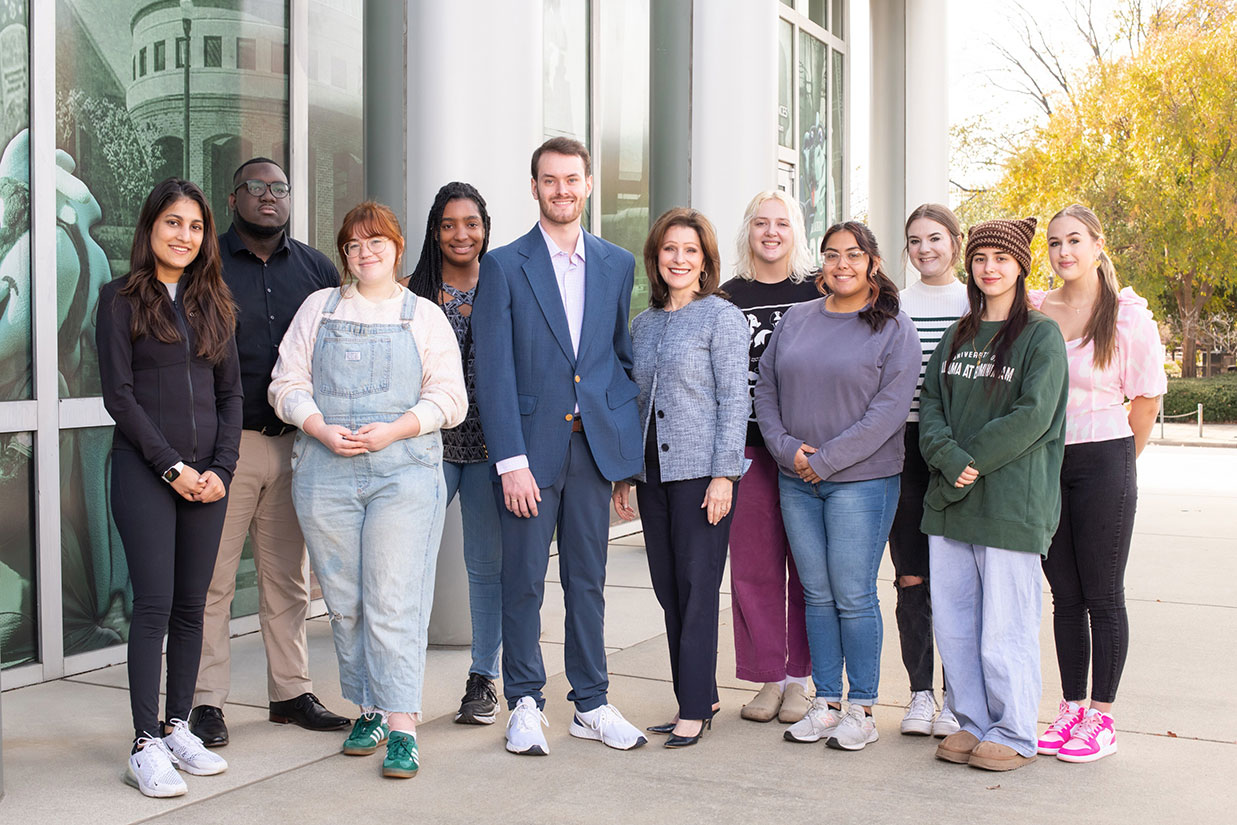 Members of the student group outside Heritage Hall. 