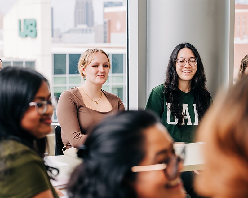 Students talking together in class