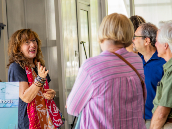 A group of attendees at One for the Books in conversation