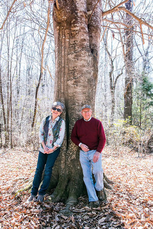 Jane and Jim Ed Mulkin on a walk in the woods. 