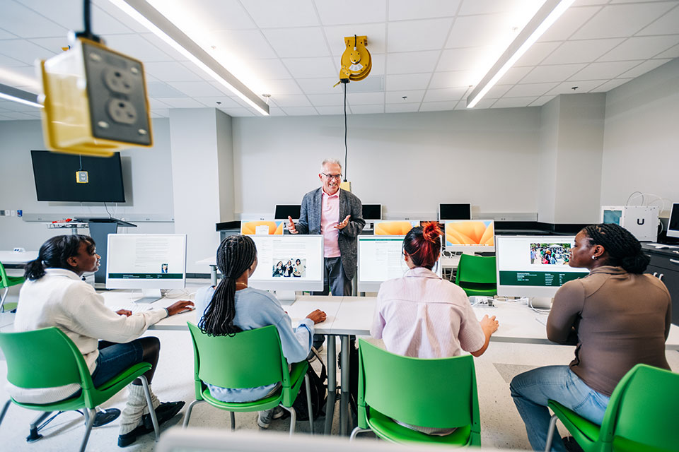 Dr. Perakis teaching a class. 