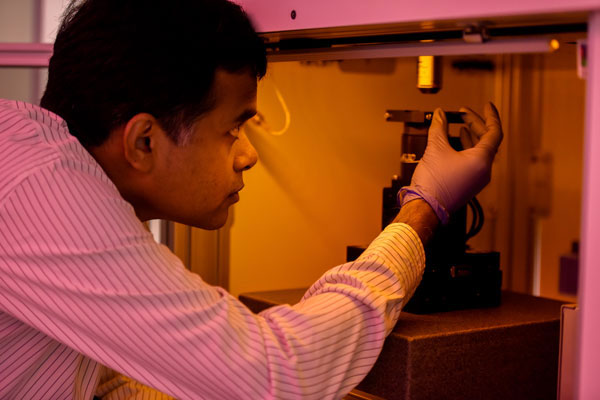 Assistant working with Equipment