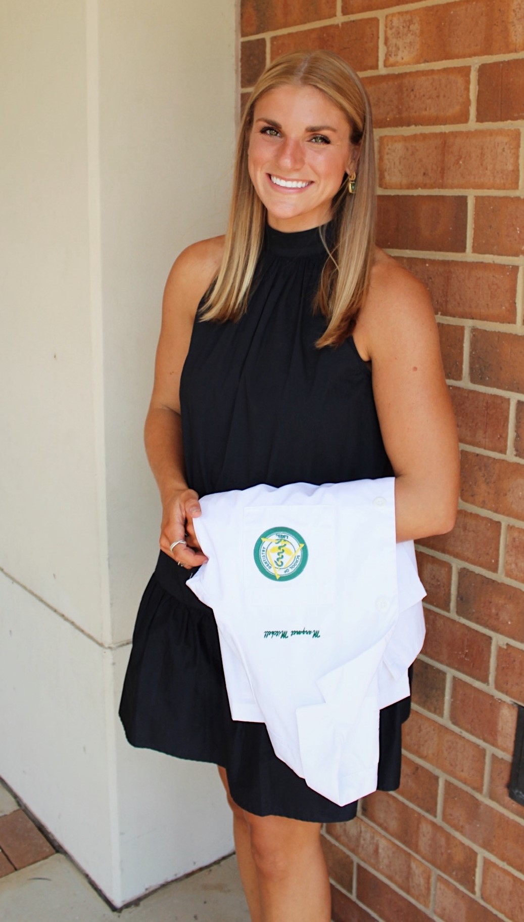 Maggie Mitchell with her white coat