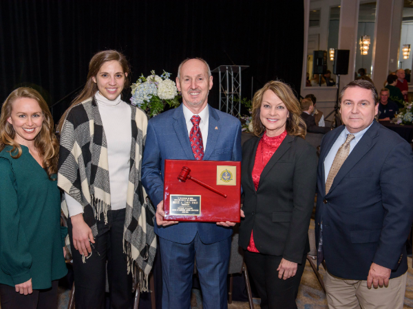 Scott Huffman with colleagues and staff