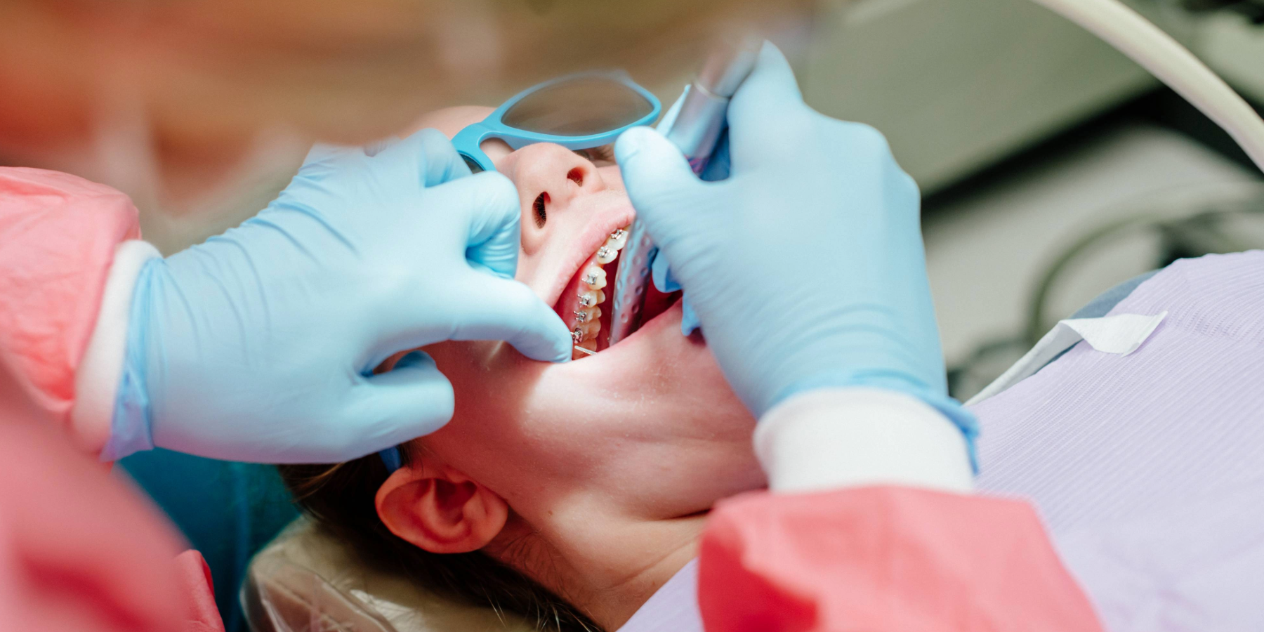 Child receiving dental care by UAB orthodontist