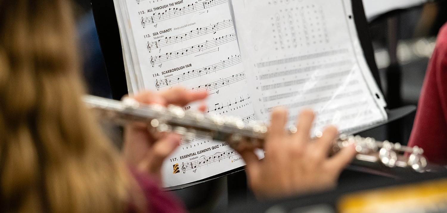 Photo of student playing flute