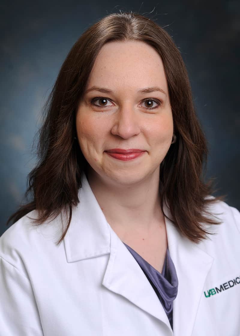 Headshot photo of faculty member of Christina Muzny.