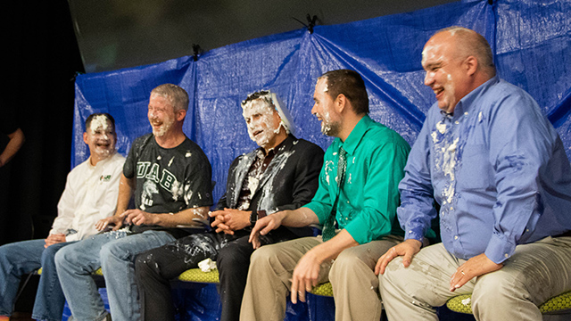 UAB IT leadership takes part in Pi Day pie throwing contest