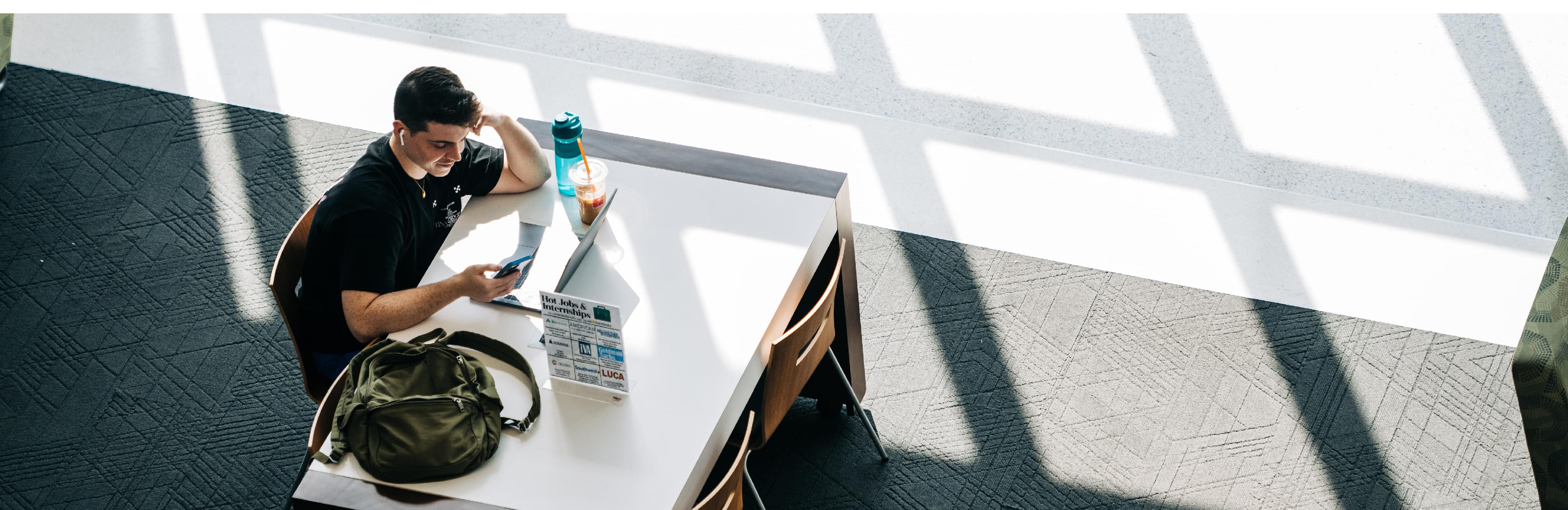 Student studying in UAB library