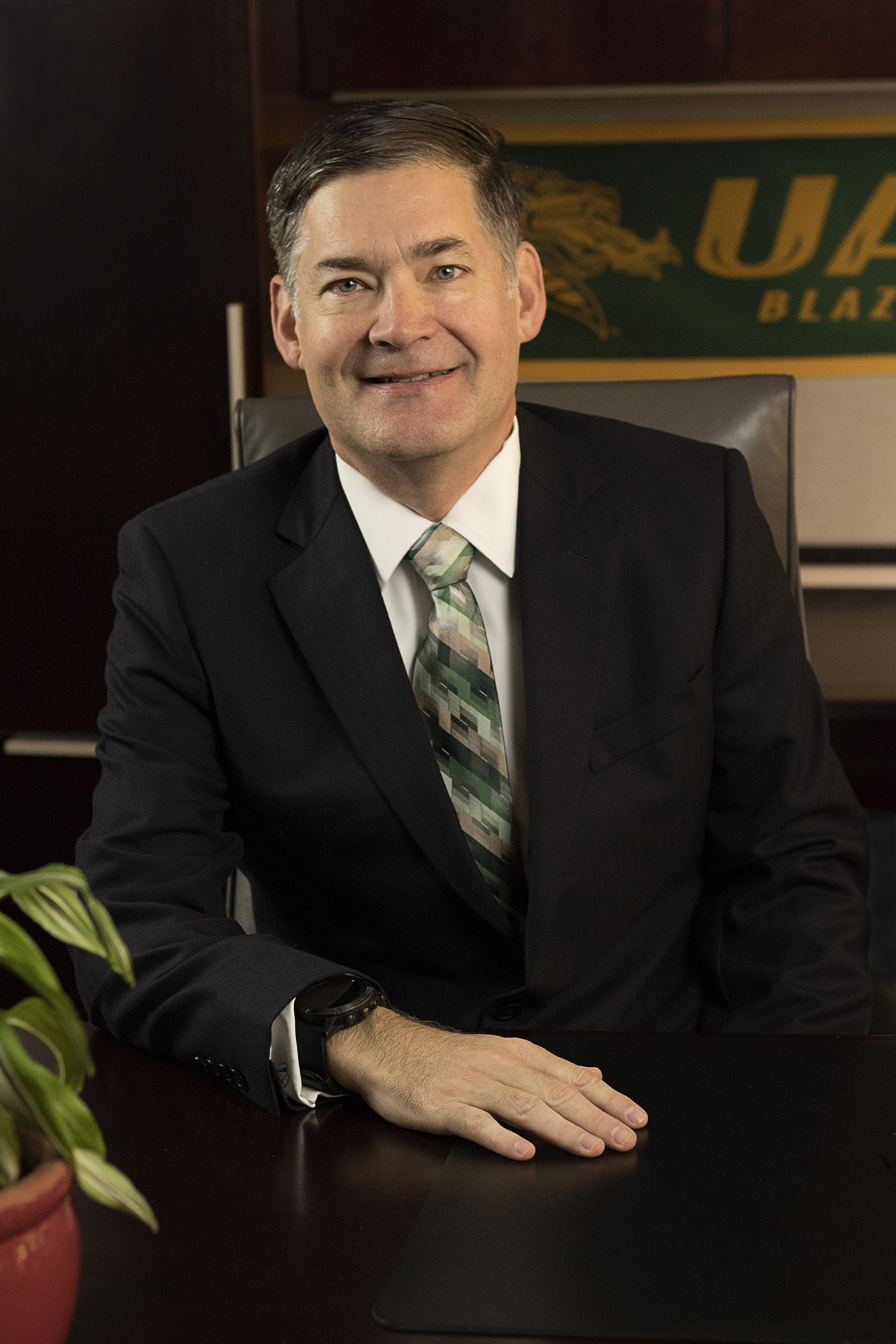 Portrait of CIO Curt Carver sitting at his desk