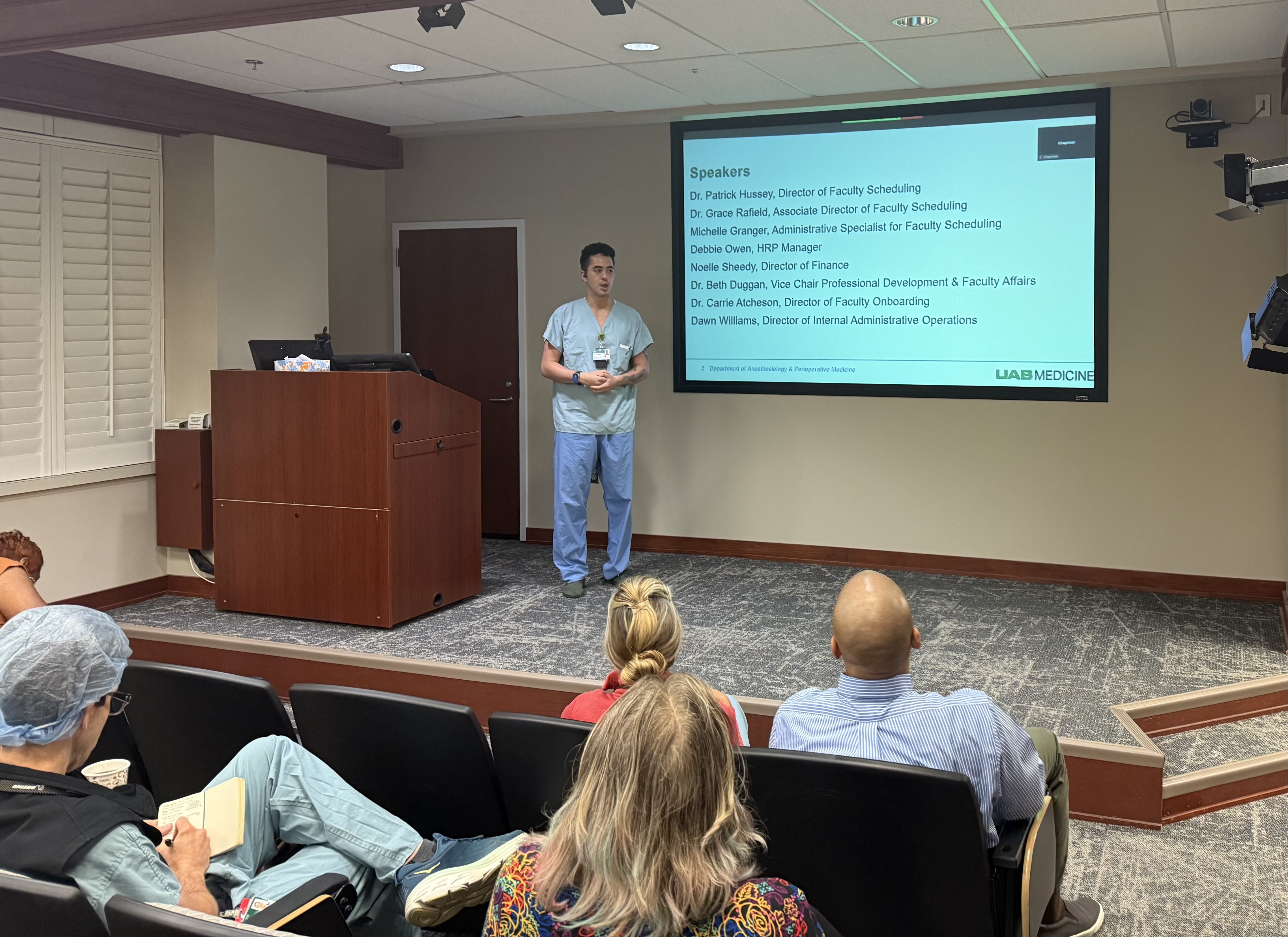 Hussey presenting