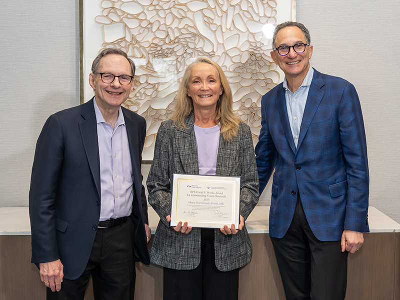 Maria Grant receiving the Research to Prevent Blindness (RPB) David F. Weeks Award for Outstanding Vision Research