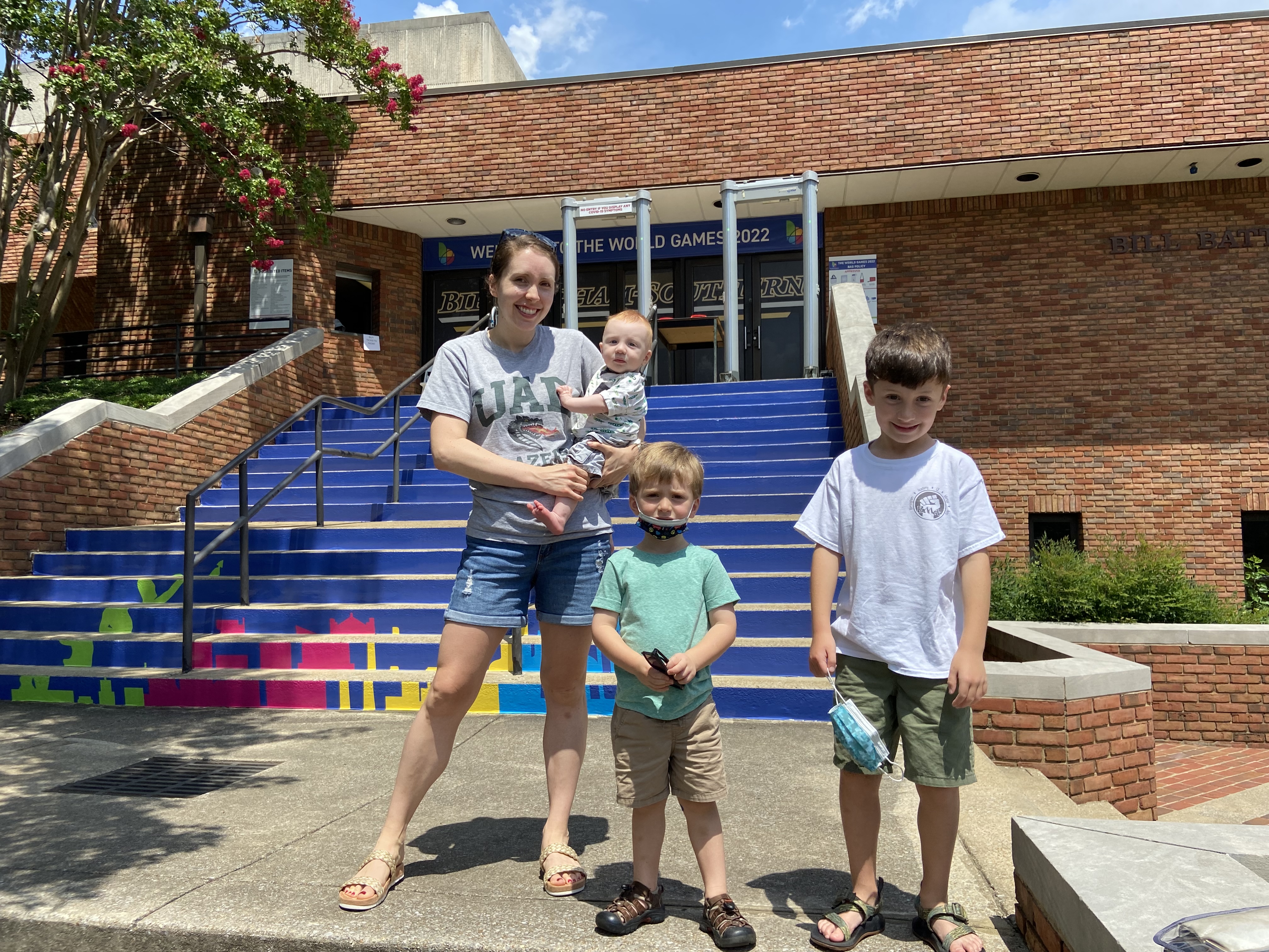 Caroline Cohen, Ph.D., R.D., L.D., with her family before a karate competition.