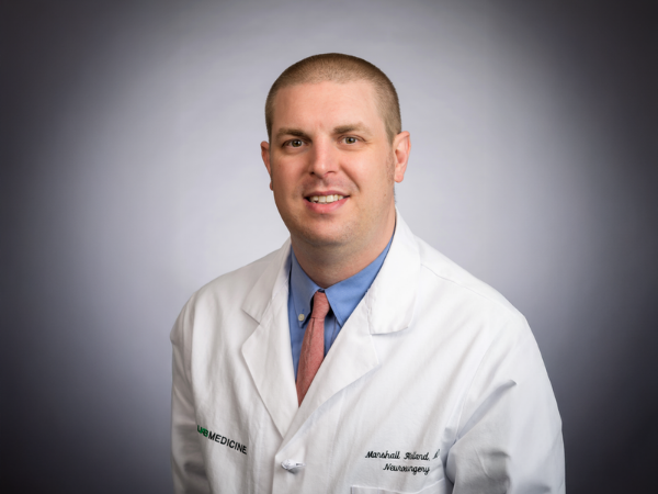 Man in white doctor's coat 