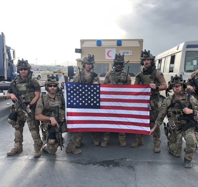 SOST team with American flag.