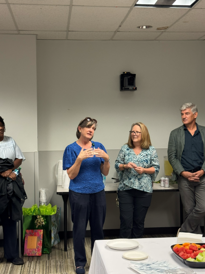 Julie Decker speaking at her retirement ceremony