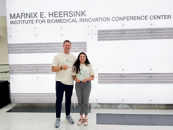 Stevan Fairburn, M.D., MS and Stéphanie Marie Aguilera posing in the MIHIBI Conference Center