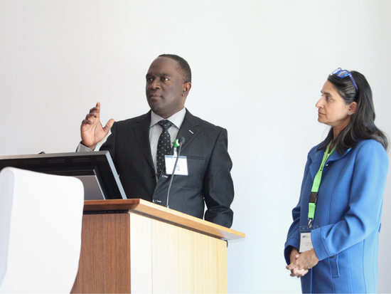 Alan Tita, M.D., Ph.D., and Sonia Anand, M.D., Ph.D, speaking at the ALGEN boardroom podium