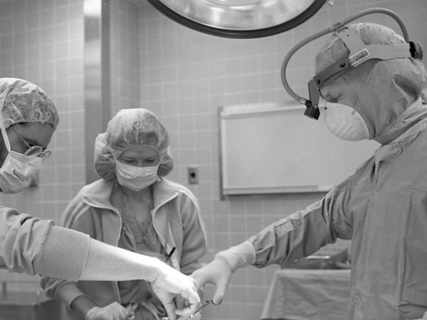 Dr. Glenn Peters performs surgery in 1989