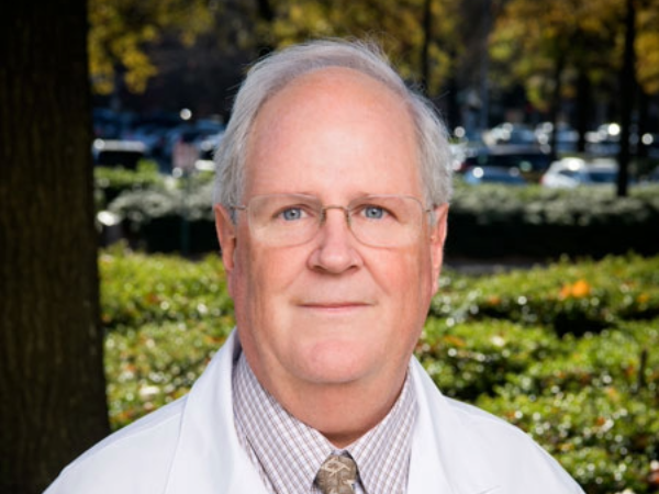 Headshot of Dr. David Standaert