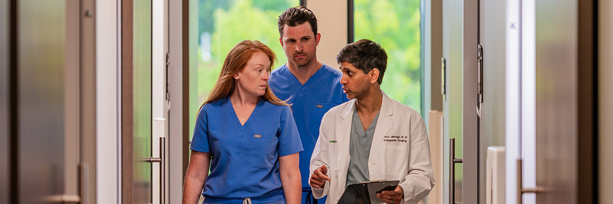 Sports Medicine Section providers walking down hallway