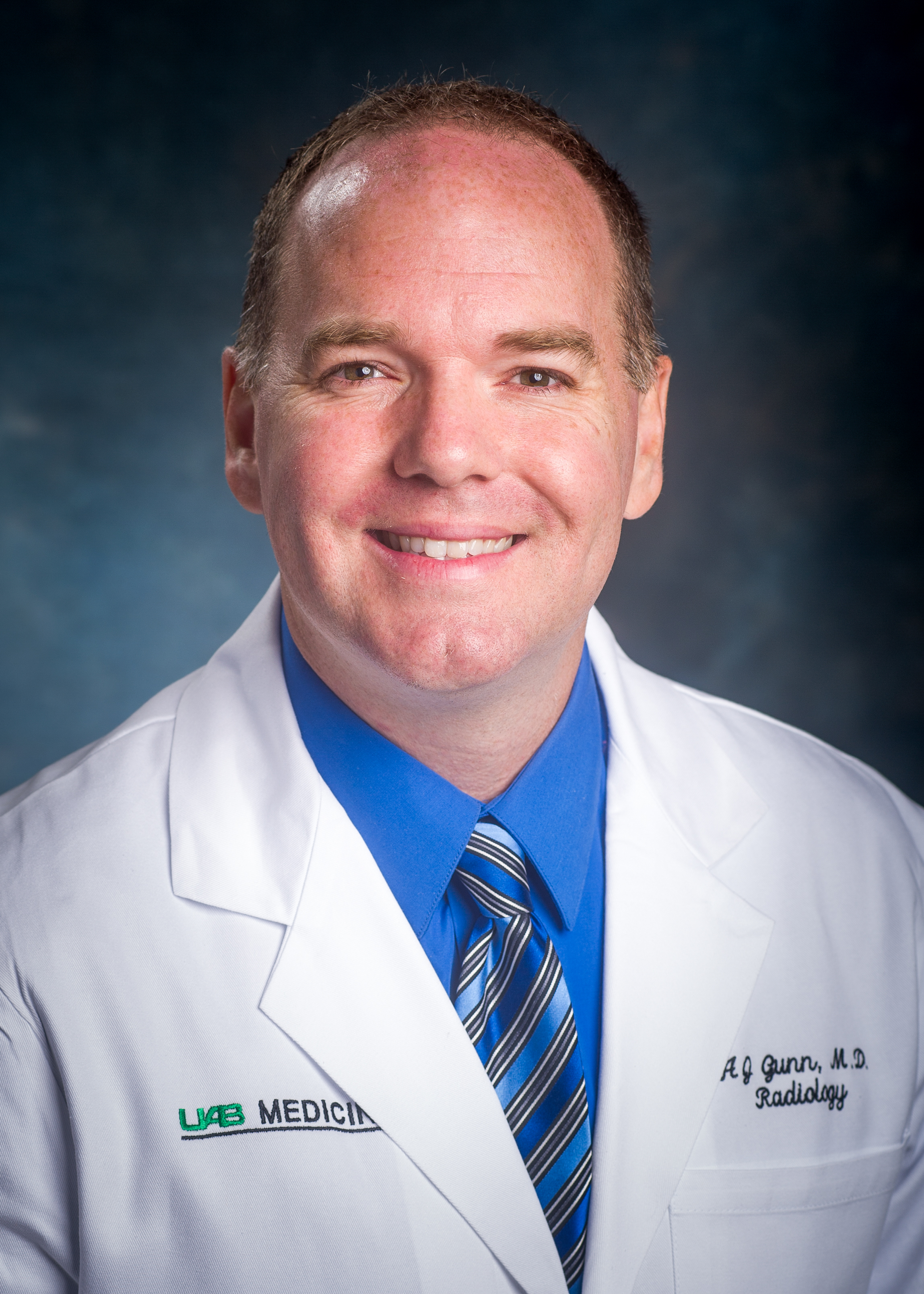Andrew J. Gunn, M.D.