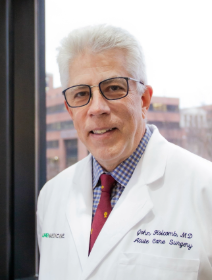 Holcomb, John B., M.D.