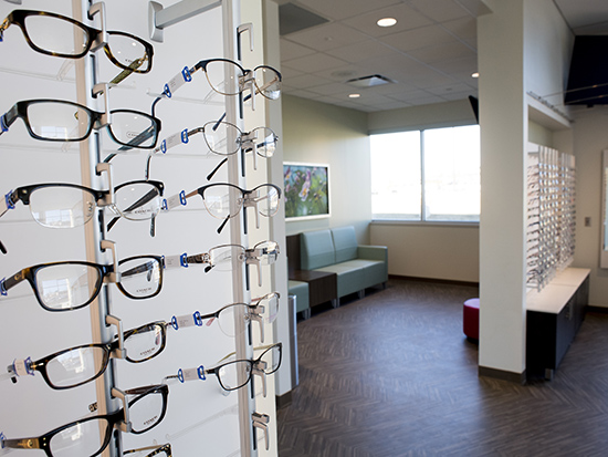 Lobby and eyeglasses displays inside the UAB Callahan Eye Hospital Clinic at the UAB Medicine Primary and Specialty Care Clinic, Gardendale, 2019.