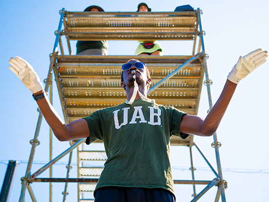 Rodgers-Johnson directs the Marching Blazers during band camp on the Intramural Fields.