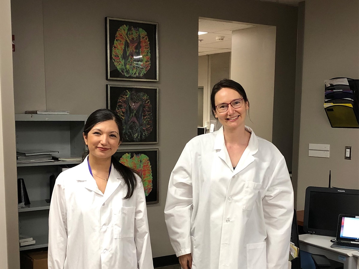 Pinar Demirayak, Ph.D., and Kristina Visscher, Ph.D  in a lab setting