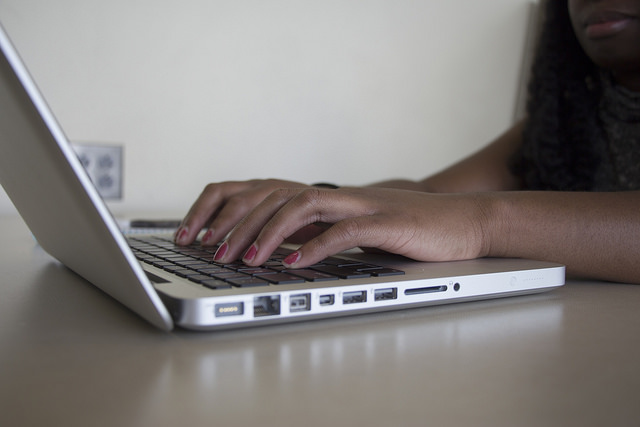UAB student works on a computer