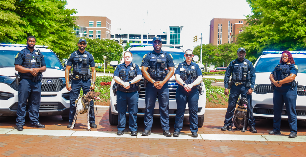 Officers pose on campus