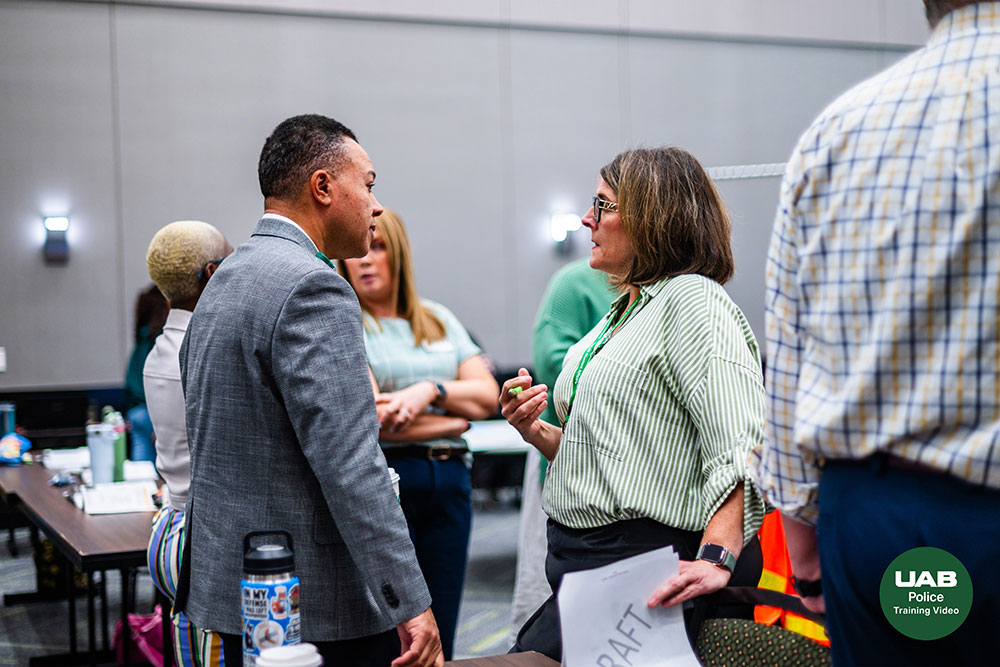 Chief Green and a participant talk during the training exercise
