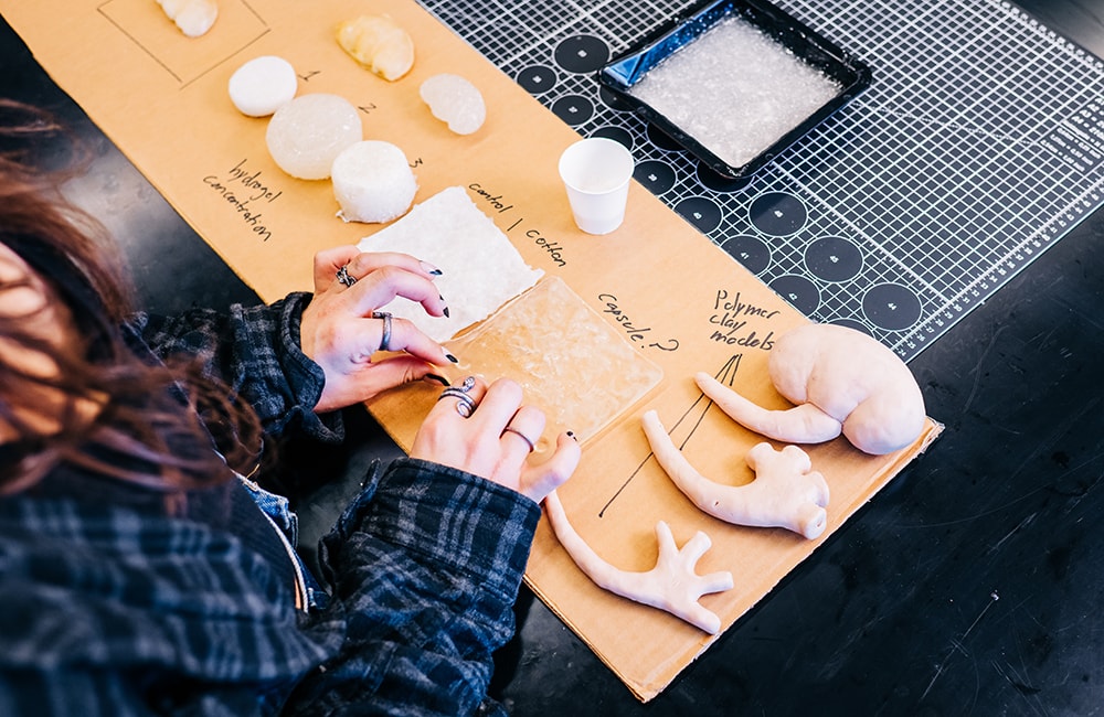 Boydstun adjusts several different prototypes of kidney models, including hydrogel concentrations, polymer clay models and more