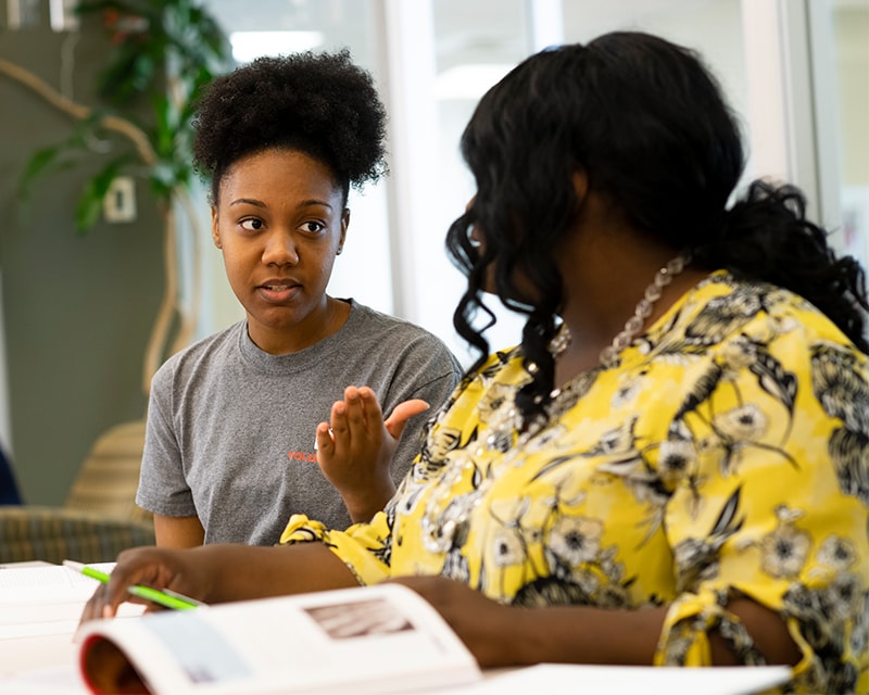 Students in the Learning Resource Library.