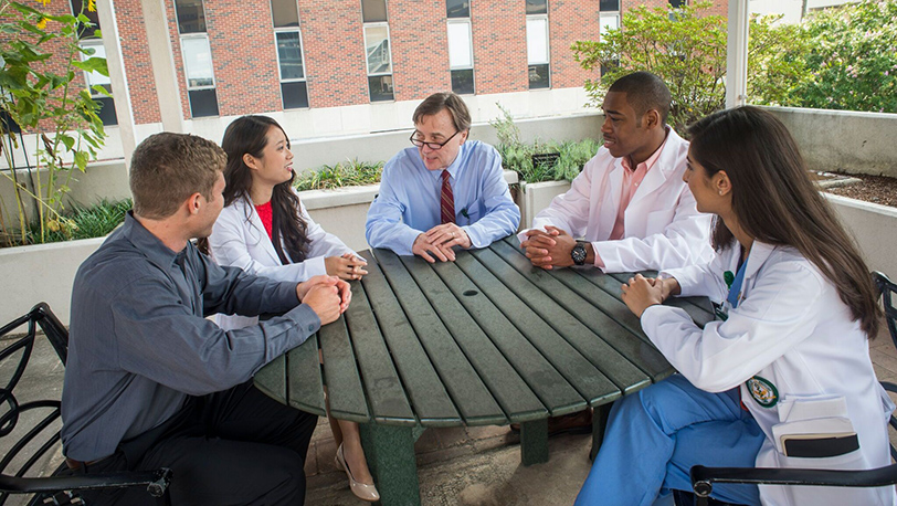 Students with Dr. Pence at Picnic Table